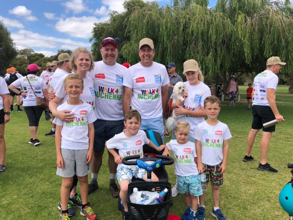 Reece with the Jones family raising money for Duchenne Muscular Dystrophy